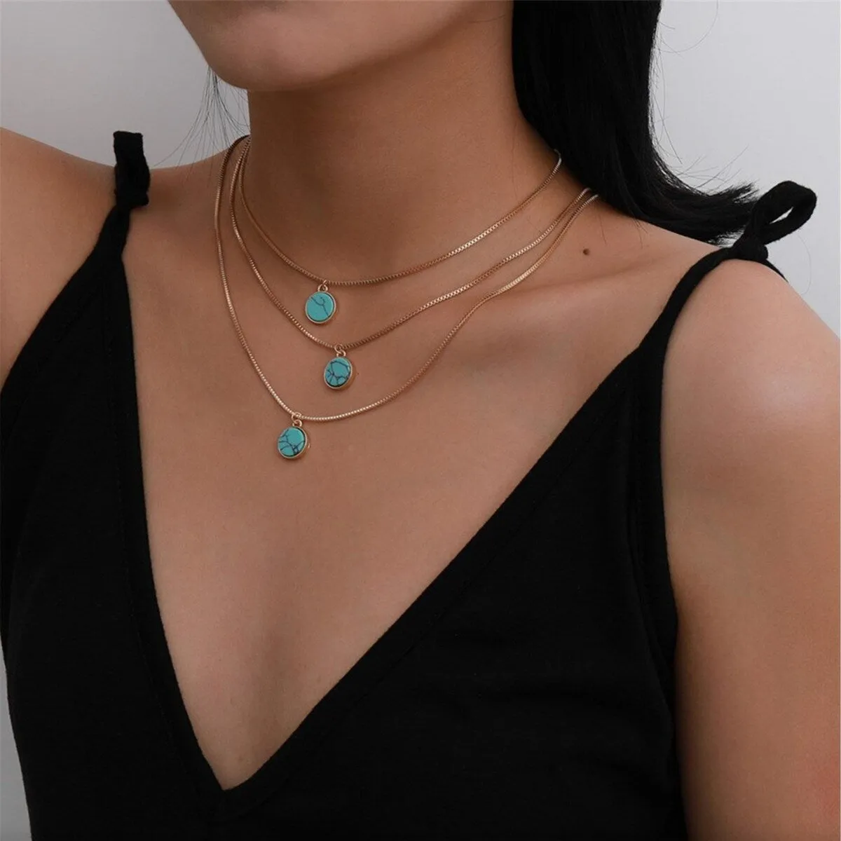 Turquoise Layered Gold Necklace - White sold by Zulily