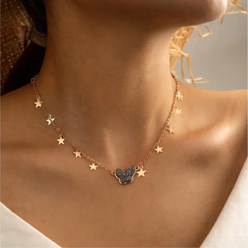 Goldtone Star Necklace With Grey Butterfly - White sold by Zulily