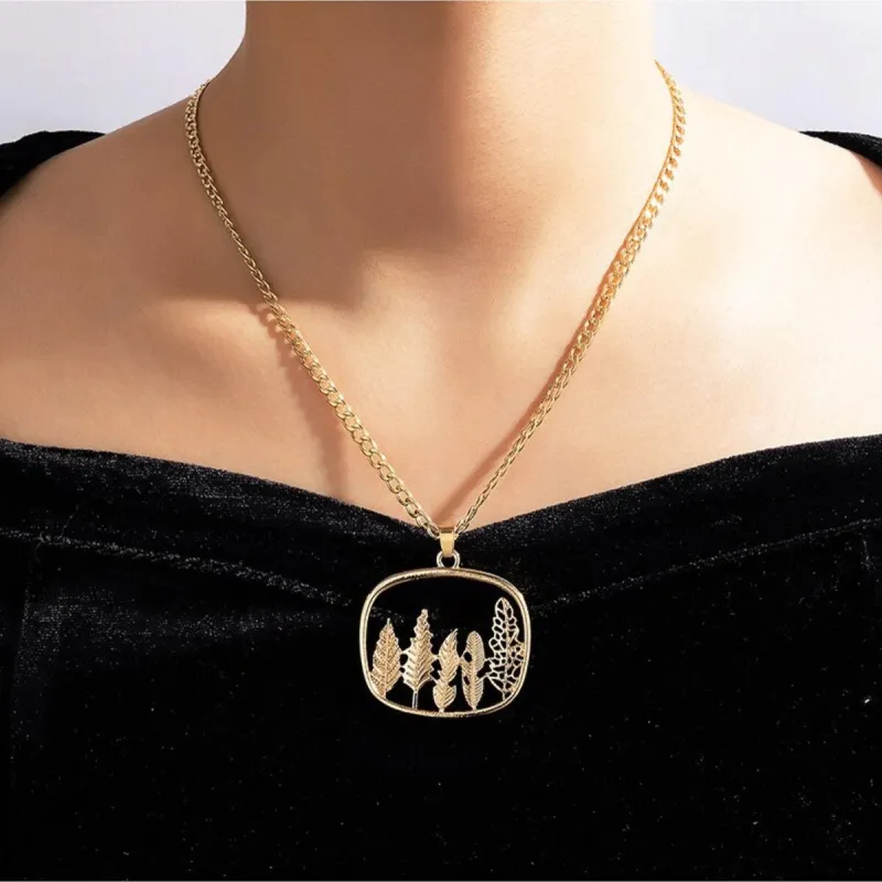 Goldtone Open Forest Pendant Necklace - White sold by Zulily