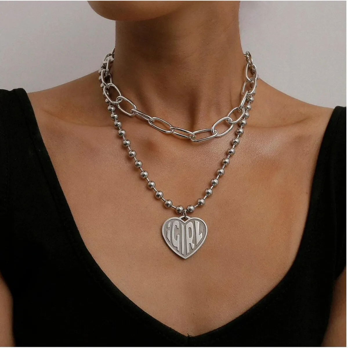 Silvertone Layered Girl Heart Necklace - White sold by Zulily