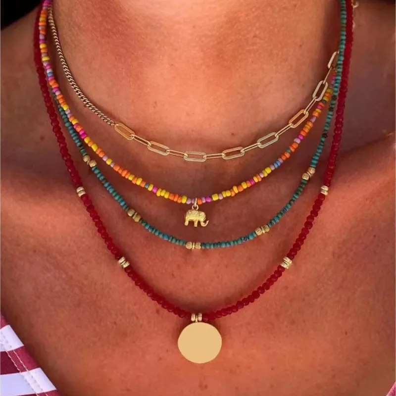Goldtone & Multi Coloured Beaded Layered Necklaces with Elephant Charm - White sold by Zulily