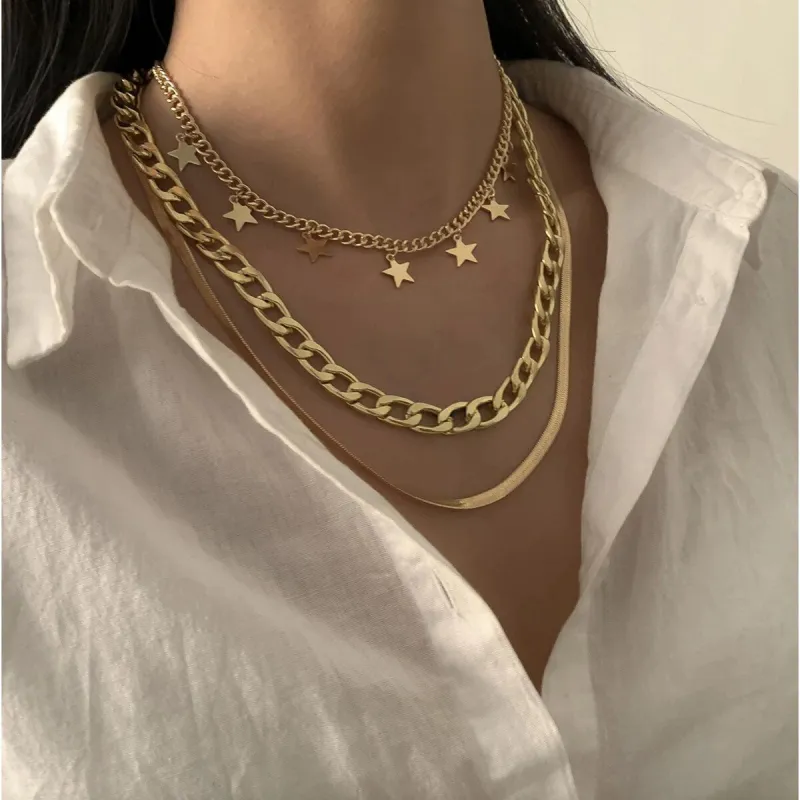 Goldtone Layered Chain Link Star Necklace - White sold by Zulily