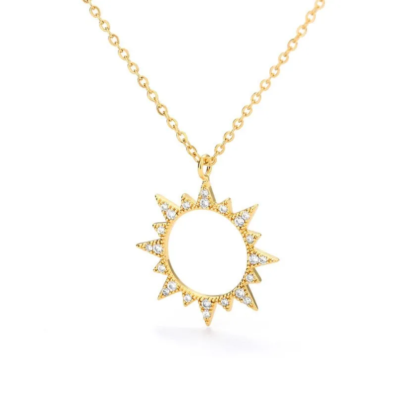 Goldtone Crystal Open Sun Pendant Necklace - White sold by Zulily