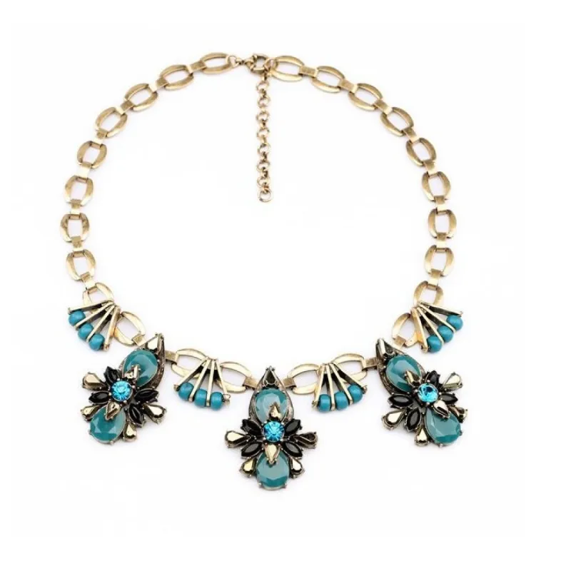 Goldtone Blue Art Deco Bib Necklace - White sold by Zulily