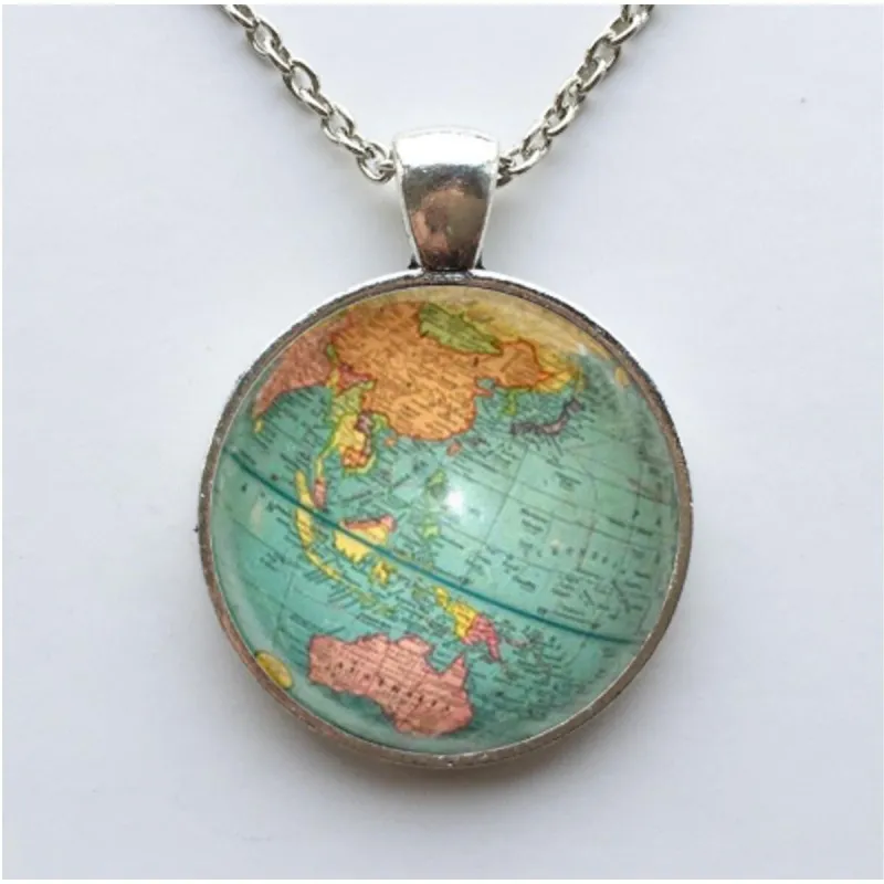 Silvertone World Map Circular Pendant Necklace - White sold by Zulily