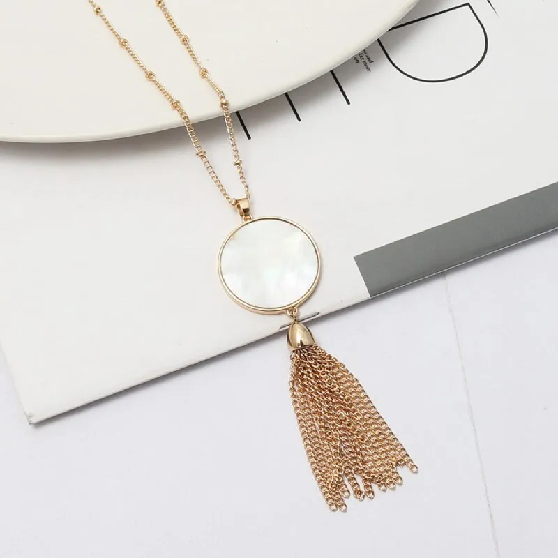 Goldtone White Circular Tasseled Pendant Necklace sold by Zulily