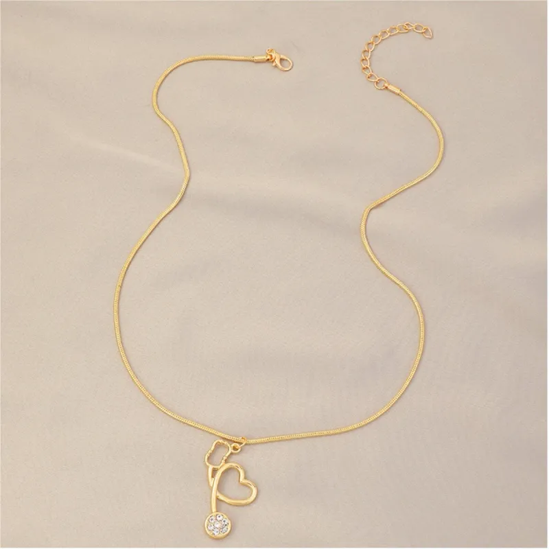 Goldtone Crystal Stethoscope Necklace - White sold by Zulily
