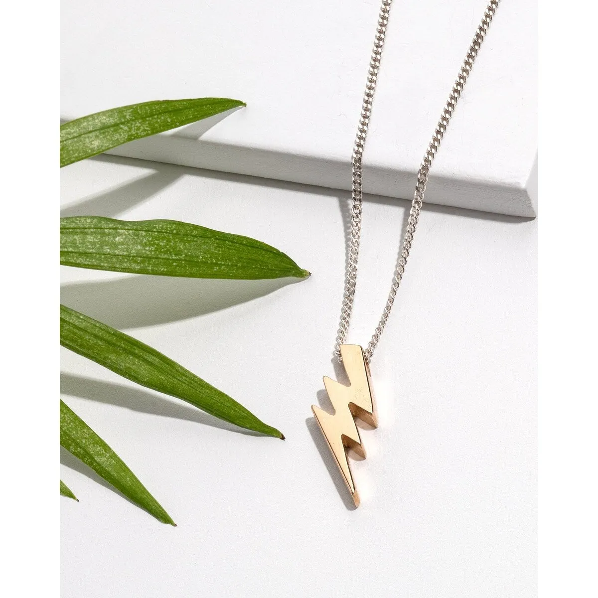 Sterling Silver & Bronze Lightning Pendant Necklace - White sold by Zulily