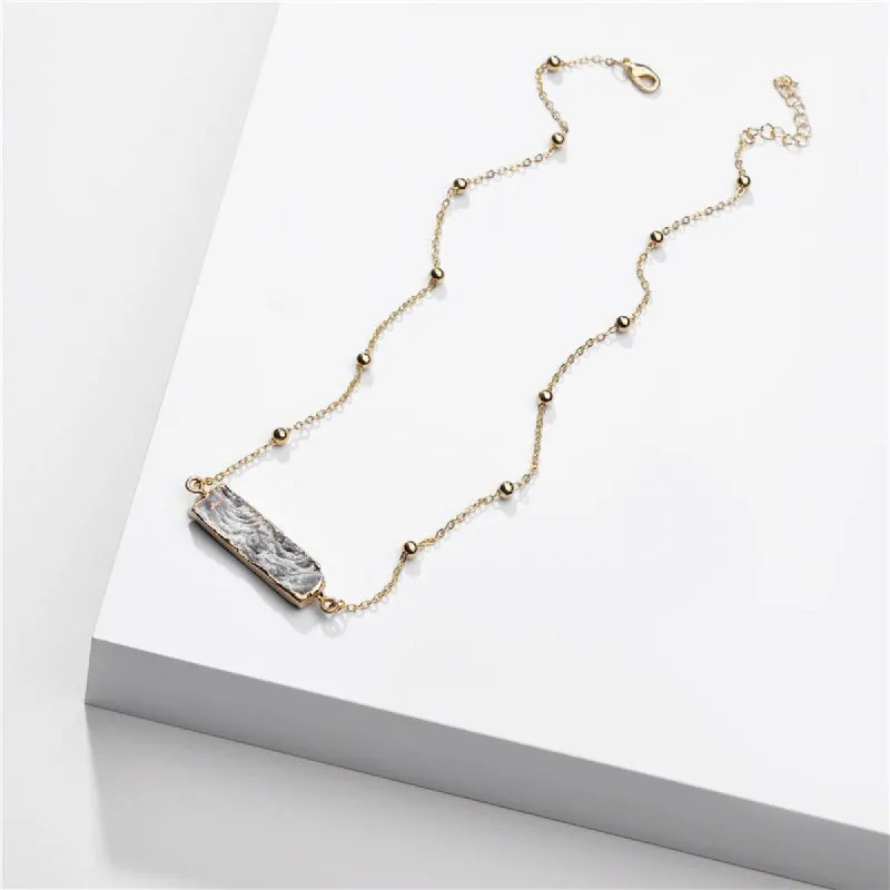 Goldtone Grey Bar Pendant Necklace - White sold by Zulily