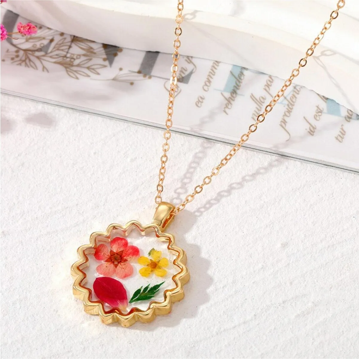 Goldtone Transparent Dried Flower Pendant Necklace - White sold by Zulily