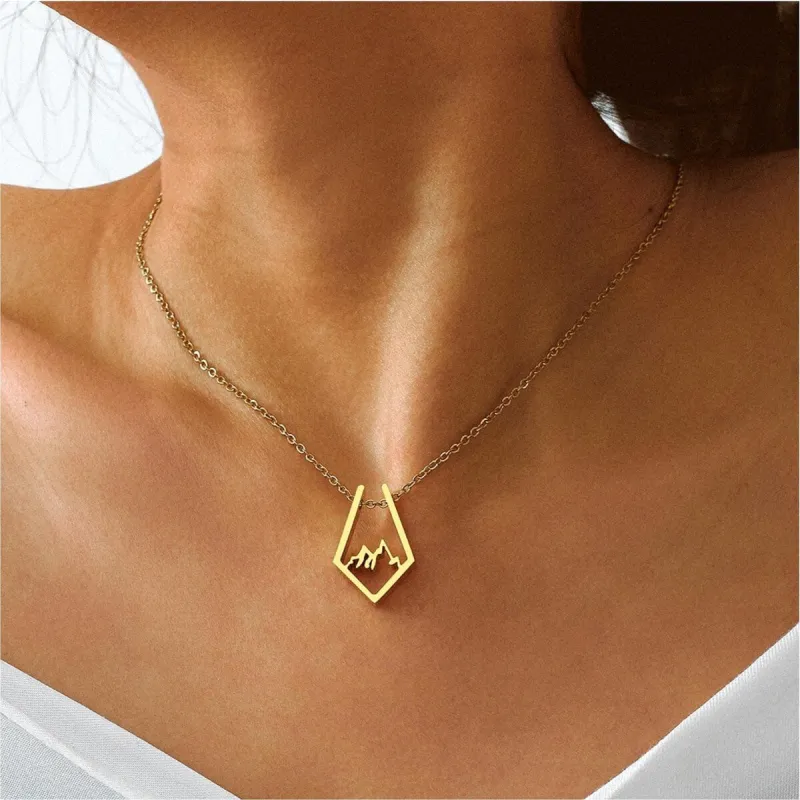 Goldtone Minimalist Mountain Range Pendant Necklace - White sold by Zulily