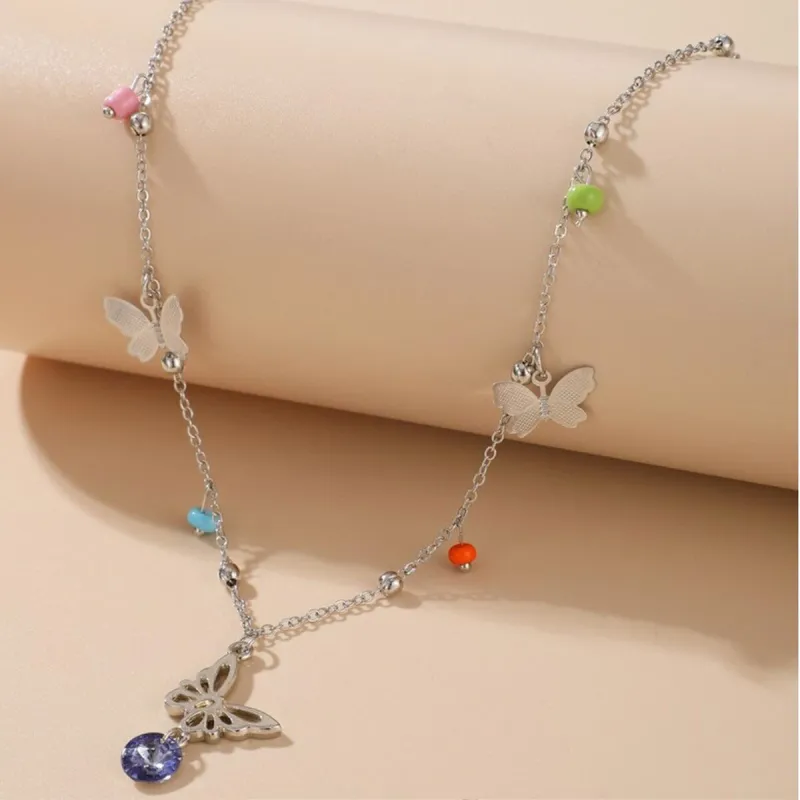 Silvertone Multi Colored Beaded Butterfly Necklace - White sold by Zulily