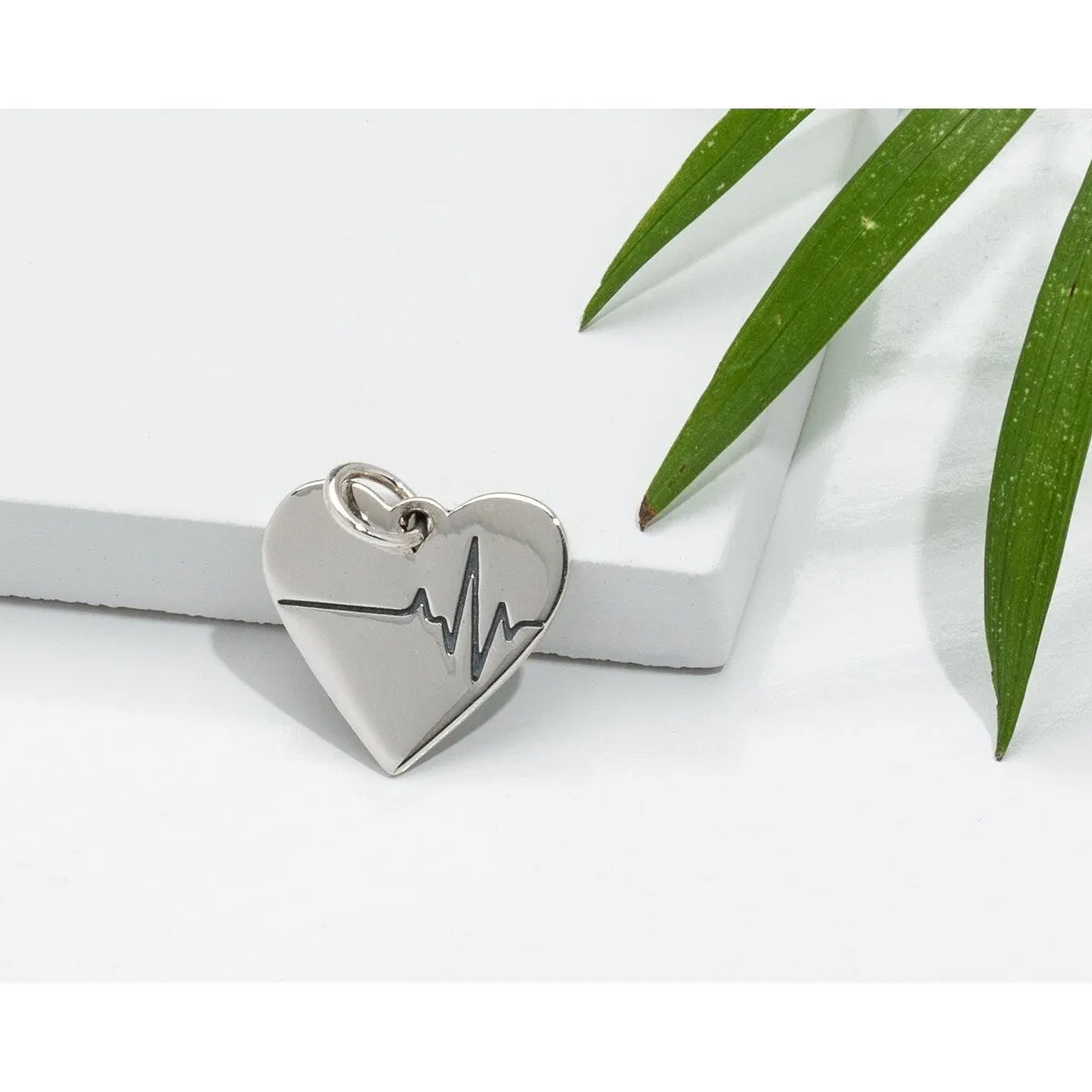 Sterling Silver Heartbeat Heart Pendant - White sold by Zulily