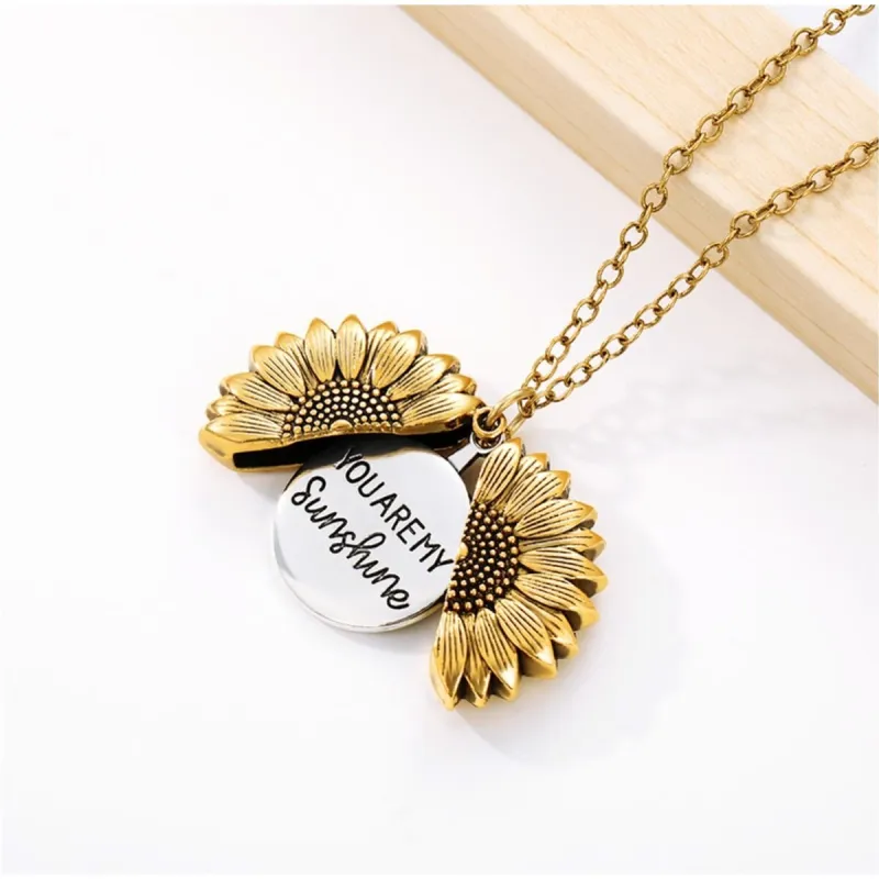 Goldtone Silvertone You Are My Sunshine Sunflower Pendant Necklace - White sold by Zulily