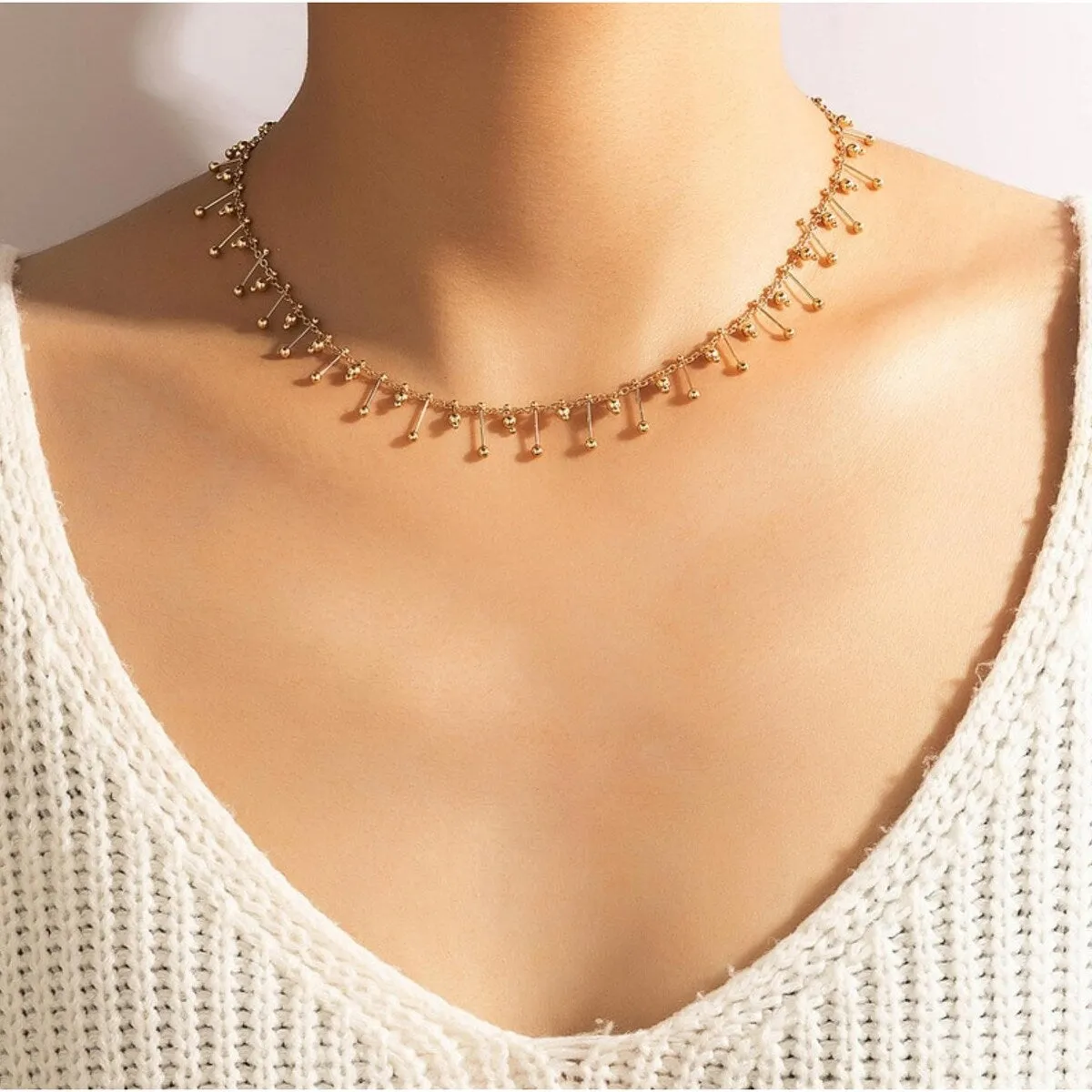 Goldtone Spiked Ball Necklace - White sold by Zulily