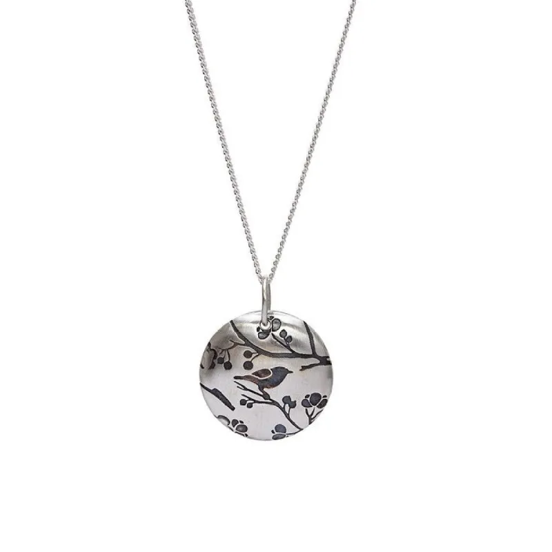 Sterling Silver Bird On Tree Branch Round Pendant Necklace - White sold by Zulily