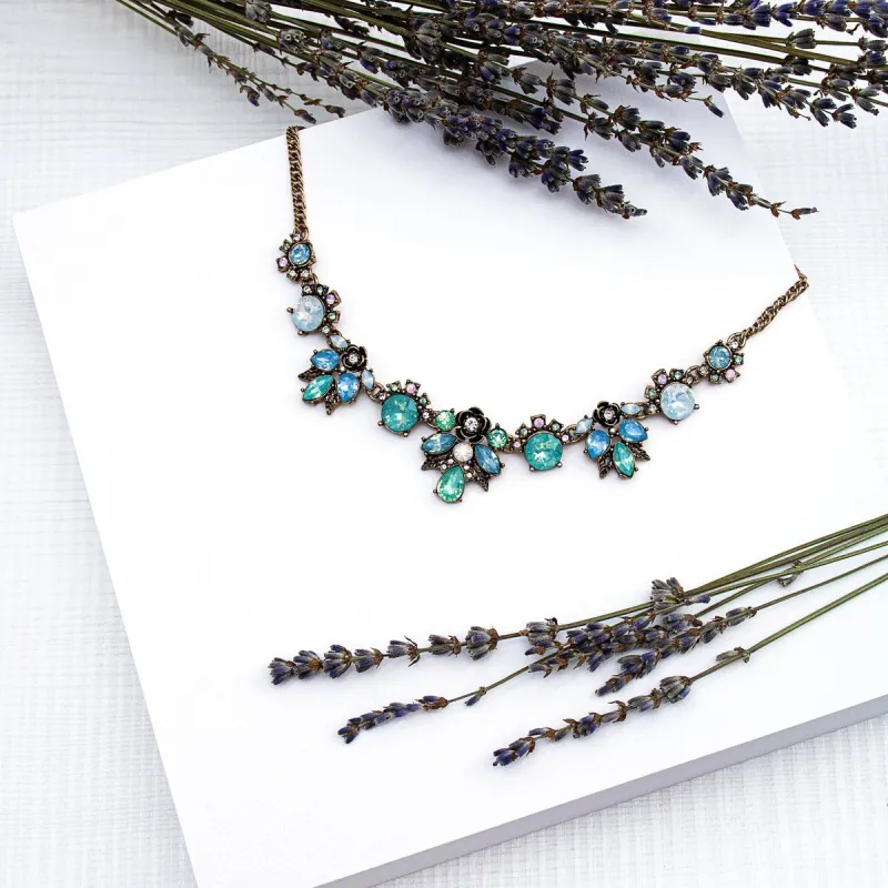Blue Green Floral Crystal Necklace - White sold by Zulily