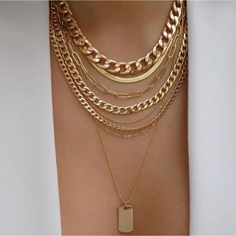 Goldtone Rope, Omega And Curb Multi Layered Necklace With Dog Tag Pendant - White sold by Zulily