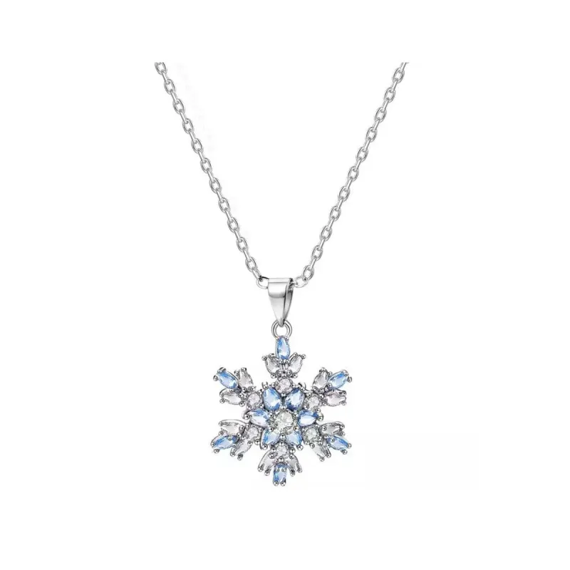 Silvertone snowflake pendant with Clear and blue CZ - White sold by Zulily