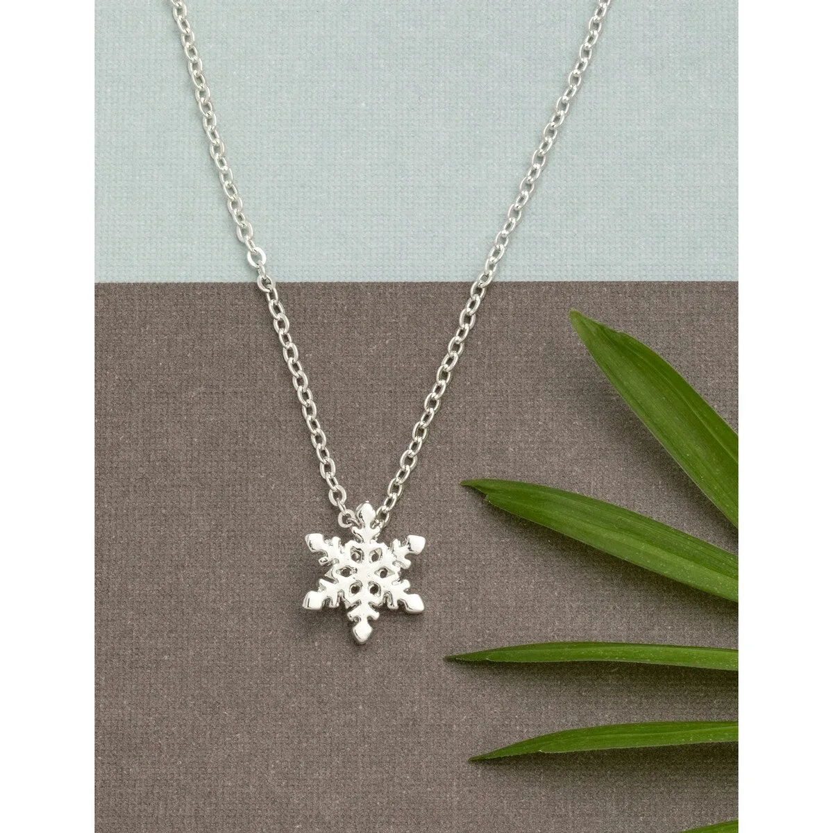 Silvertone Snowflake Pendant Necklace - White sold by Zulily