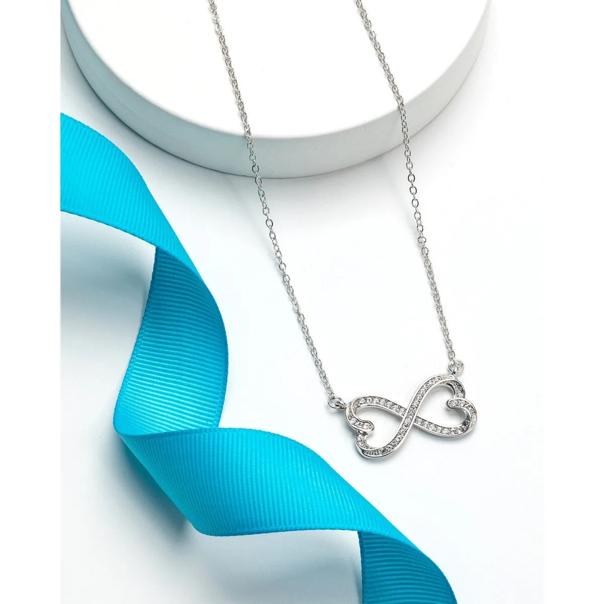Silvertone Infinity Heart Pave Set Pendant With Swarovski Crystals - White sold by Zulily