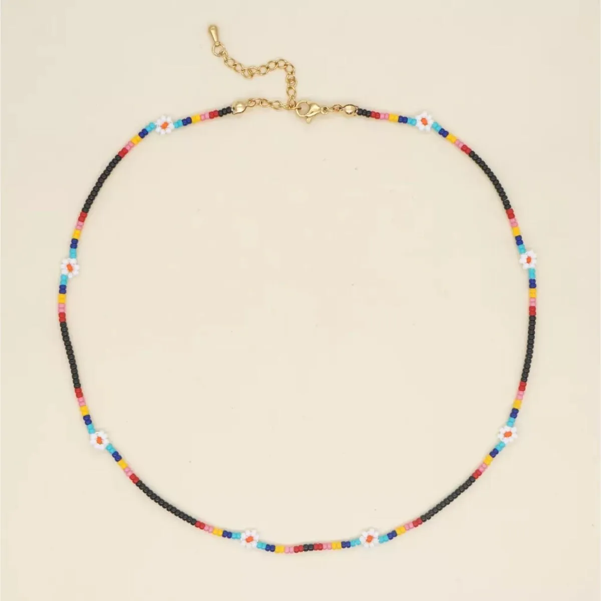 Multi Coloured & Black Beaded Necklace With Daisies - White sold by Zulily