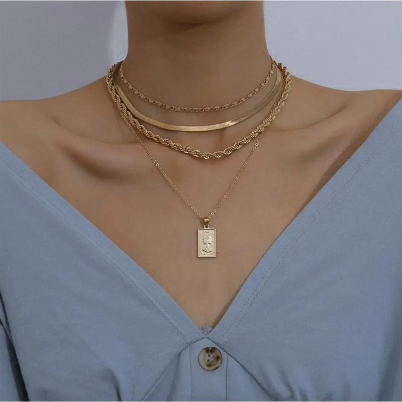 Goldtone Layered Necklace With Medallion - White sold by Zulily