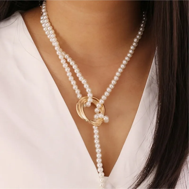 Long Imitation Pearl Necklace With Ring - White sold by Zulily