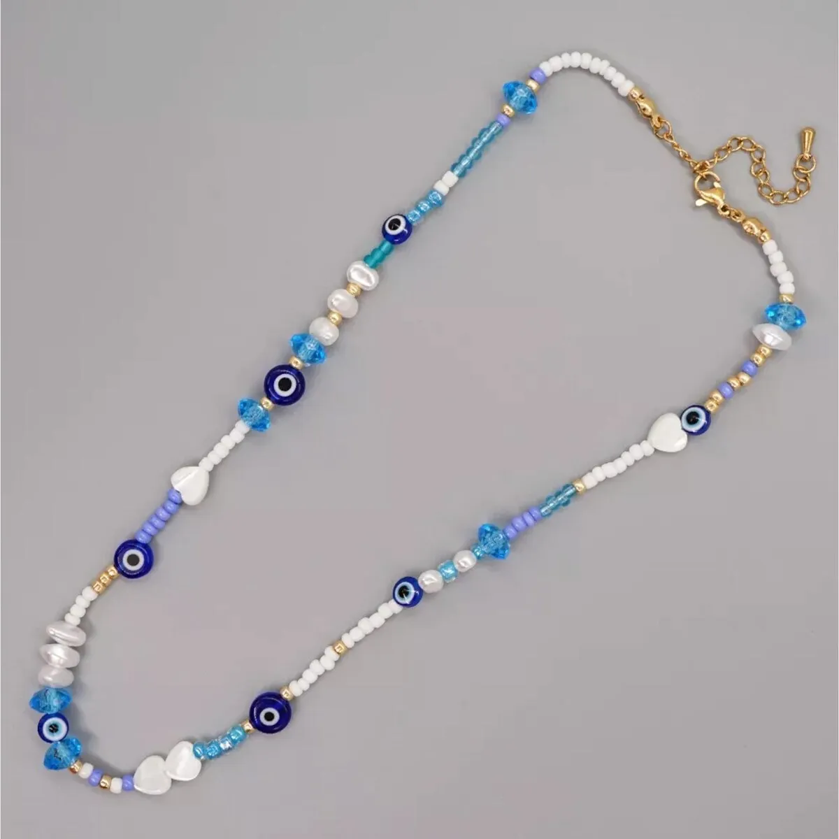 Blue & White Seed Bead Evil Eye Necklace sold by Zulily product image thumbnail 2