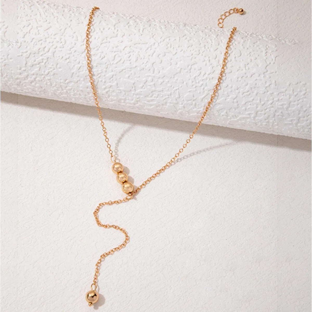 Goldtone Minimalist Ball Lariat Style Necklace - White sold by Zulily product image thumbnail 2