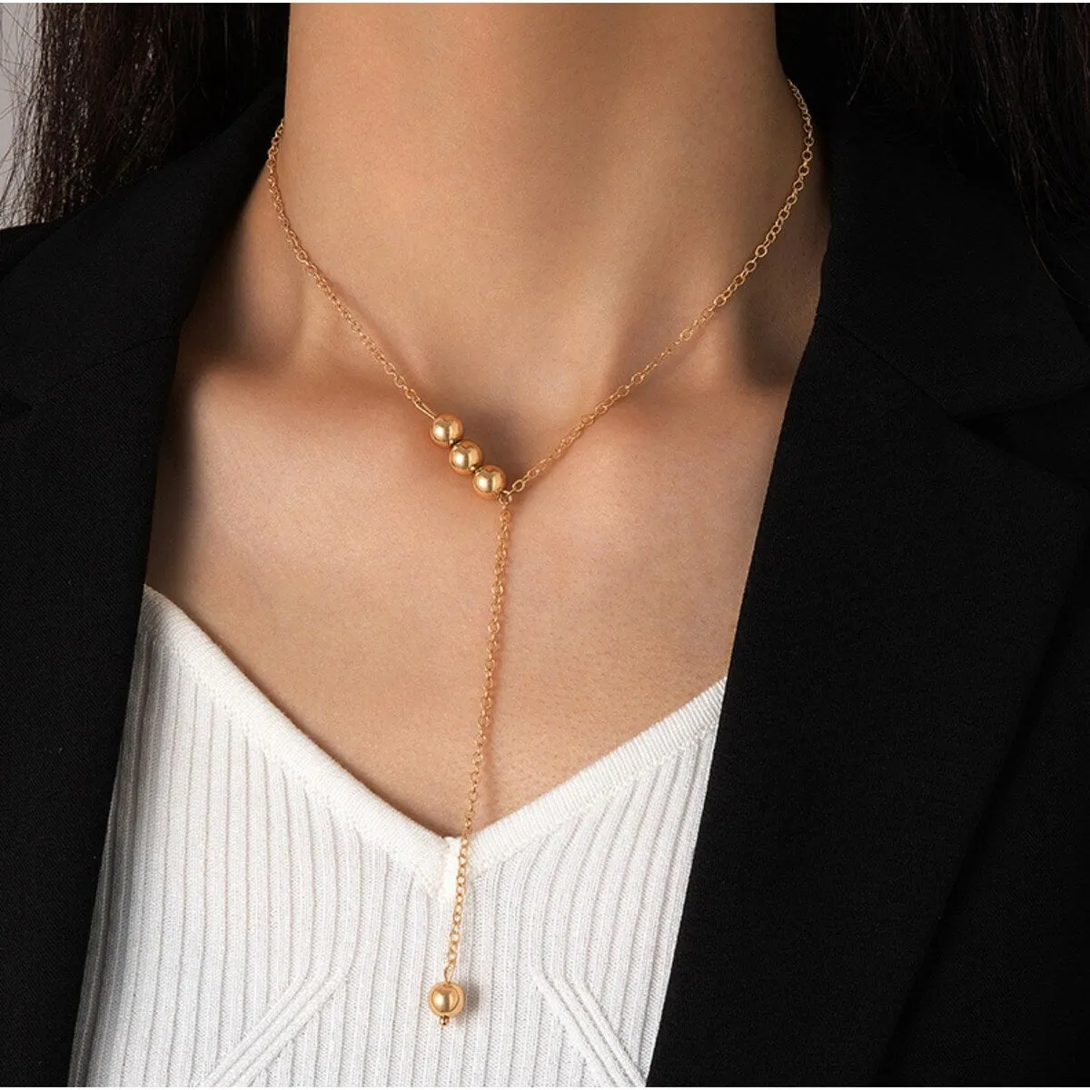 Goldtone Minimalist Ball Lariat Style Necklace - White sold by Zulily