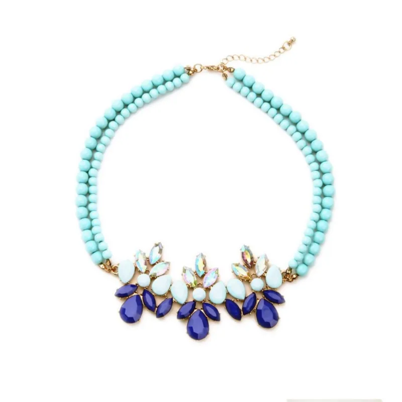 Aqua Crystal And Goldtone Statement Necklace - White sold by Zulily