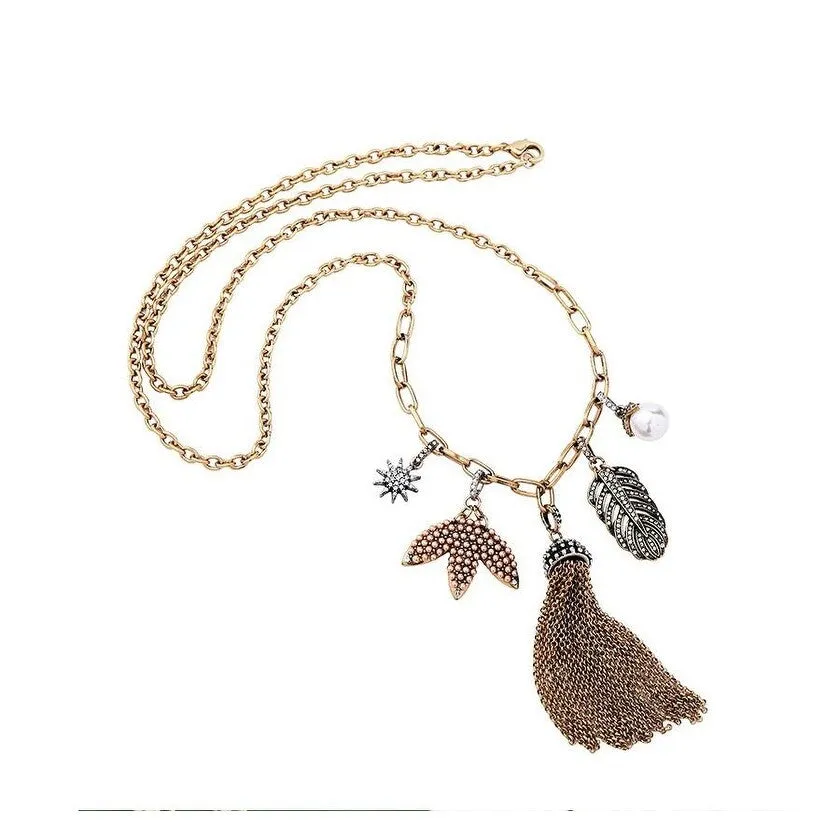 Goldtone Tasseled Charmed Long Necklace - White sold by Zulily