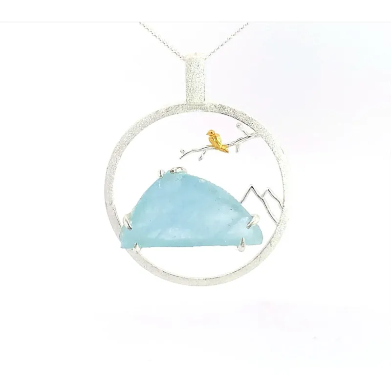 Sterling Silver Aquamarine Mountain Scenery with Gold Bird Pendant Necklace - White sold by Zulily