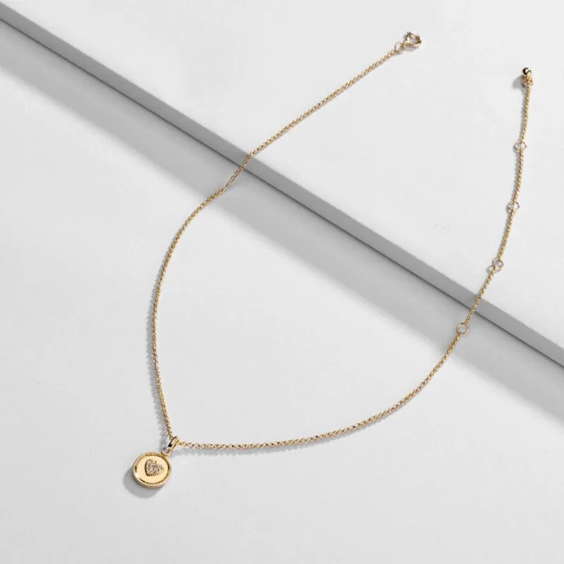 Goldtone Dainty Heart Circular Pendant Necklace - White sold by Zulily