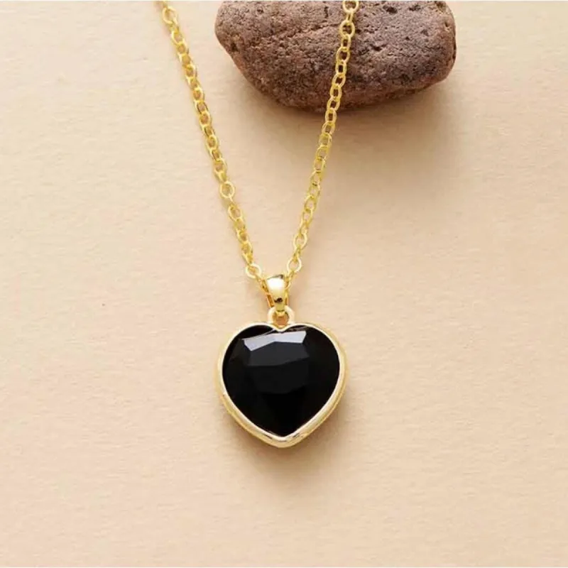 Goldtone Onyx Heart Pendant Necklace - White sold by Zulily