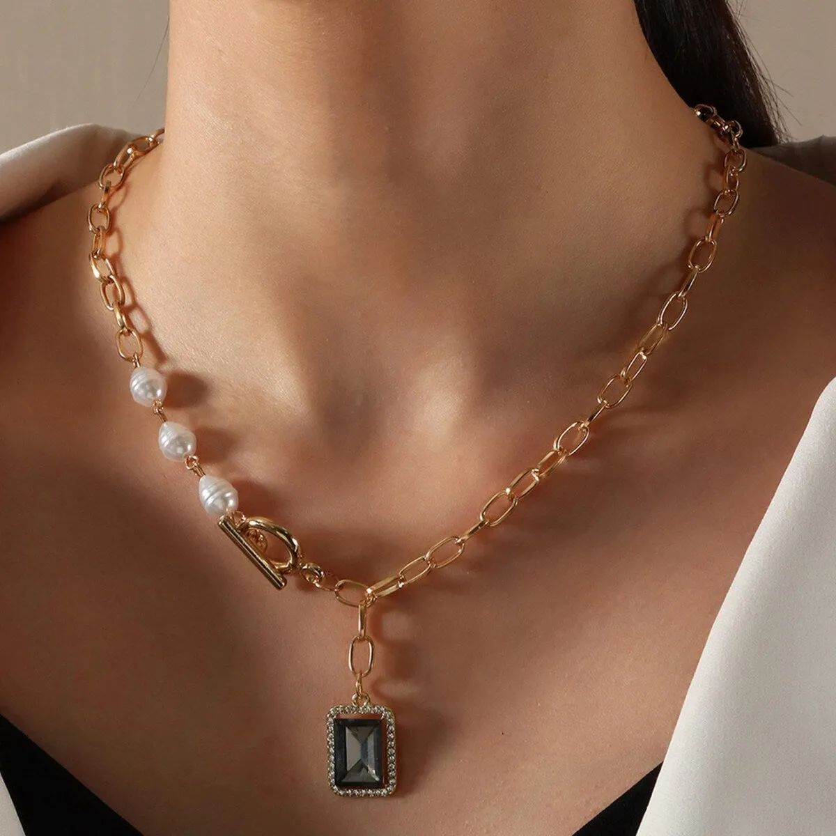 Goldtone Imitation Pearl And Grey Rectangular Crystal Pendant Necklace - White sold by Zulily