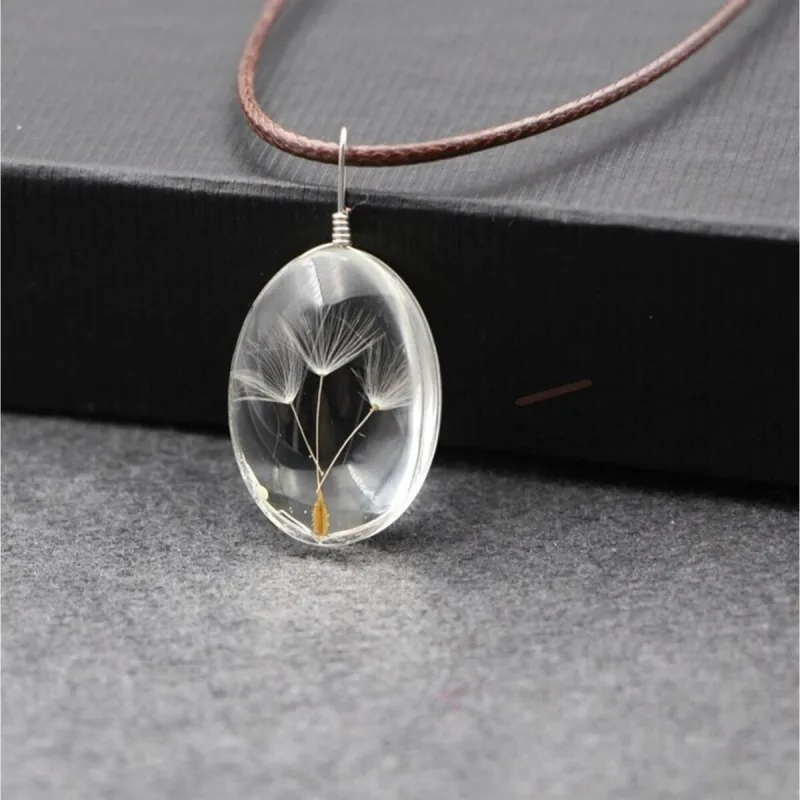 Dandelion In Clear Oval Pendant Necklace - White sold by Zulily