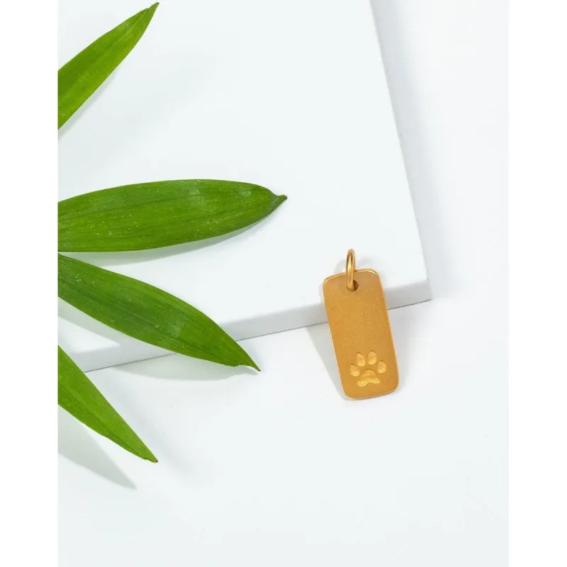 Bronze Paw Print Rectangular Pendant sold by Zulily