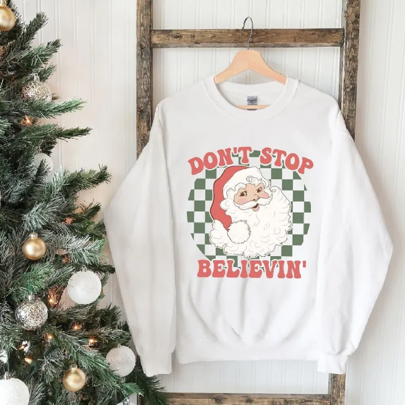 Don't Stop Believin' Santa Checkered Graphic Sweatshirt sold by Zulily