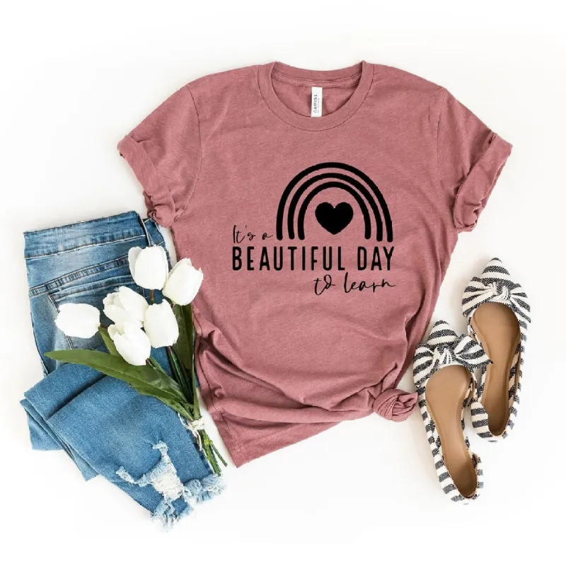It's A Beautiful Day To Learn Short Sleeve Tee sold by Zulily