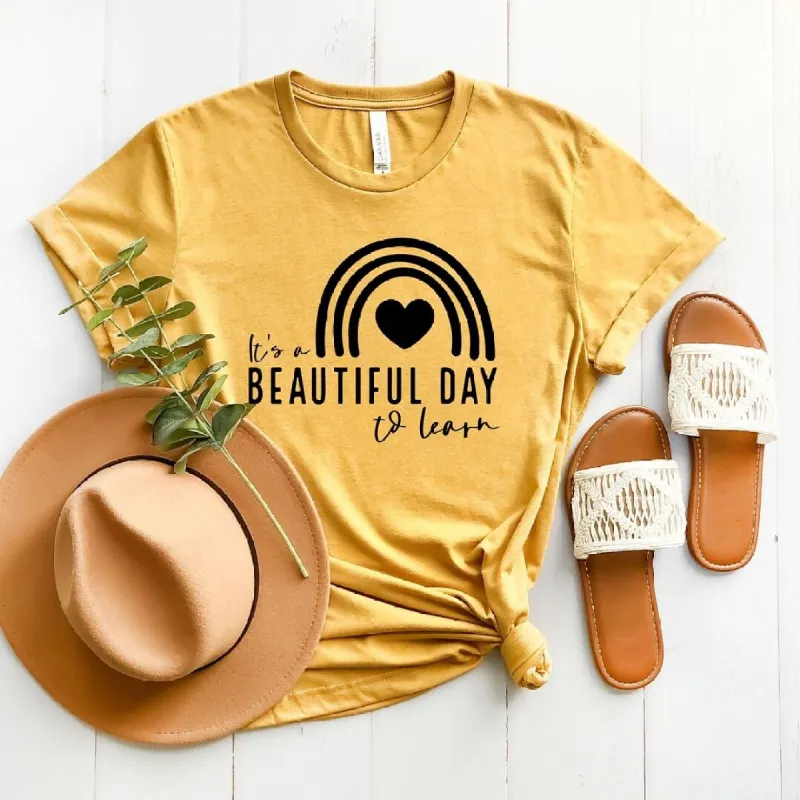 It's A Beautiful Day To Learn Short Sleeve Tee sold by Zulily