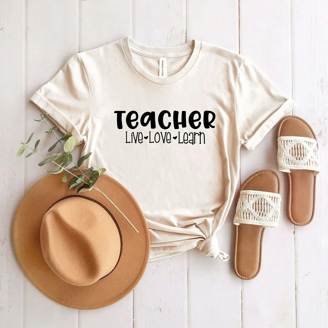 Teacher Live Love Learn Short Sleeve Crewnneck Tee sold by Zulily
