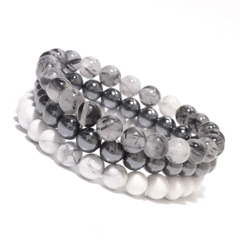 Set of 3 8MM Stretch Bracelets with Rutilated Quartz, Howlite and Hematite sold by Zulily