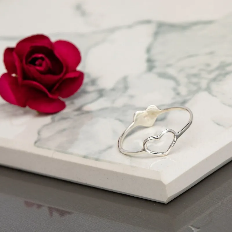 Sterling Silver Dual Heart Ring sold by Zulily