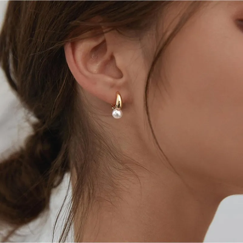 Goldtone Dainty Huggie Earrings With Imitation Pearl sold by Zulily