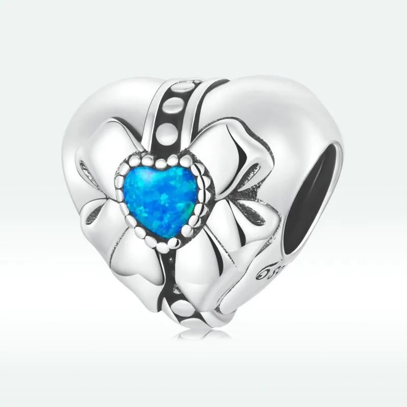 Blue Cubic Zirconia & Sterling Silver Blue Bow Heart Charm sold by Zulily
