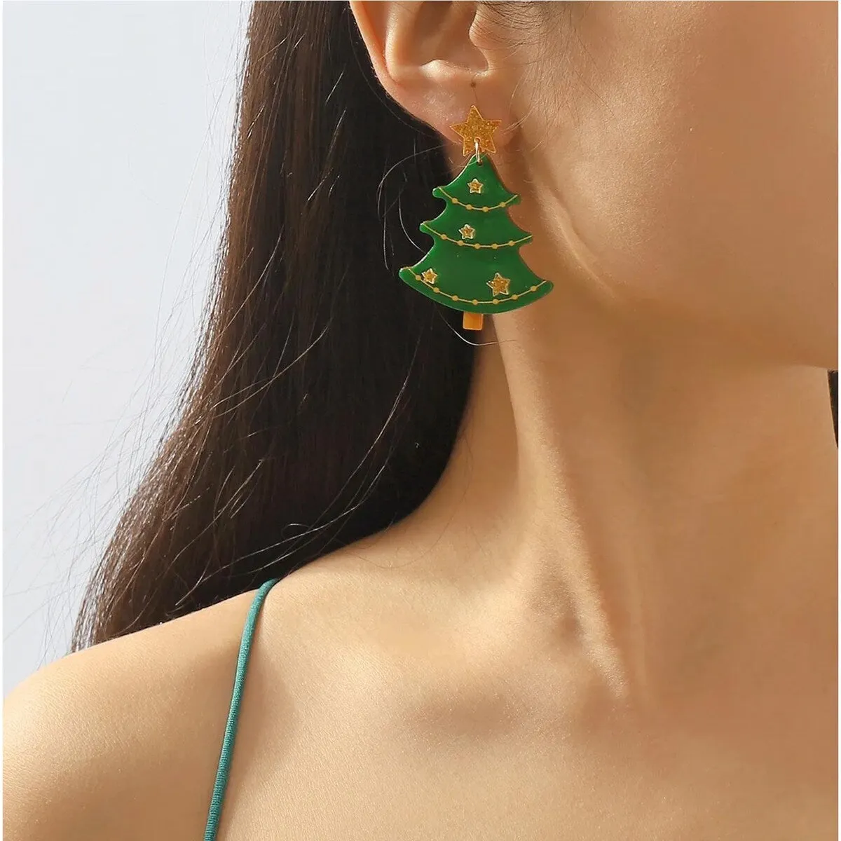 Green Christmas Tree with Gold Stars Drop Earrings sold by Zulily
