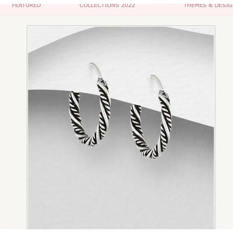 Sterling Silver Lined Hoop Earrings sold by Zulily