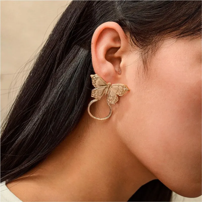 Goldtone Butterfly Open Circle Earrings sold by Zulily